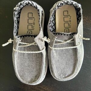 New, never worn HeyDudes Toddler size 8. Received as a gift/never worn